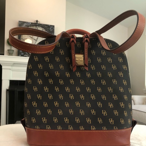 Dooney & Bourke Handbags - Dooney and Bourke - New with registration card - Brown Tmoro Backpack.